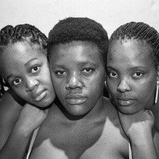 A portrait of the photographer's girlfriend and her two sisters