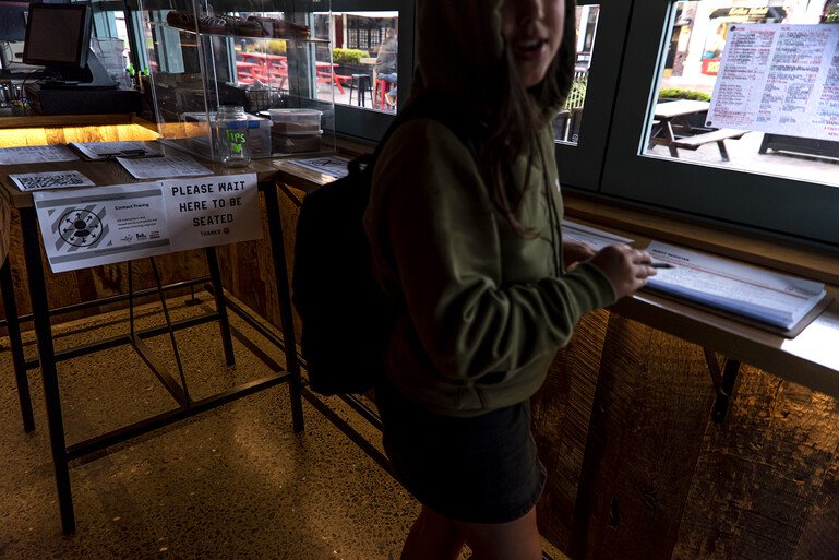 A young girl in her favourite burger place