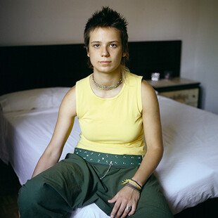 Two images showing a woman sitting on a bed and a corridor in the house where she was abused