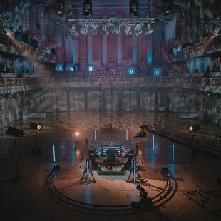 An organist practices in an empty concert hall, with no spectators allowed due to the pandemic.